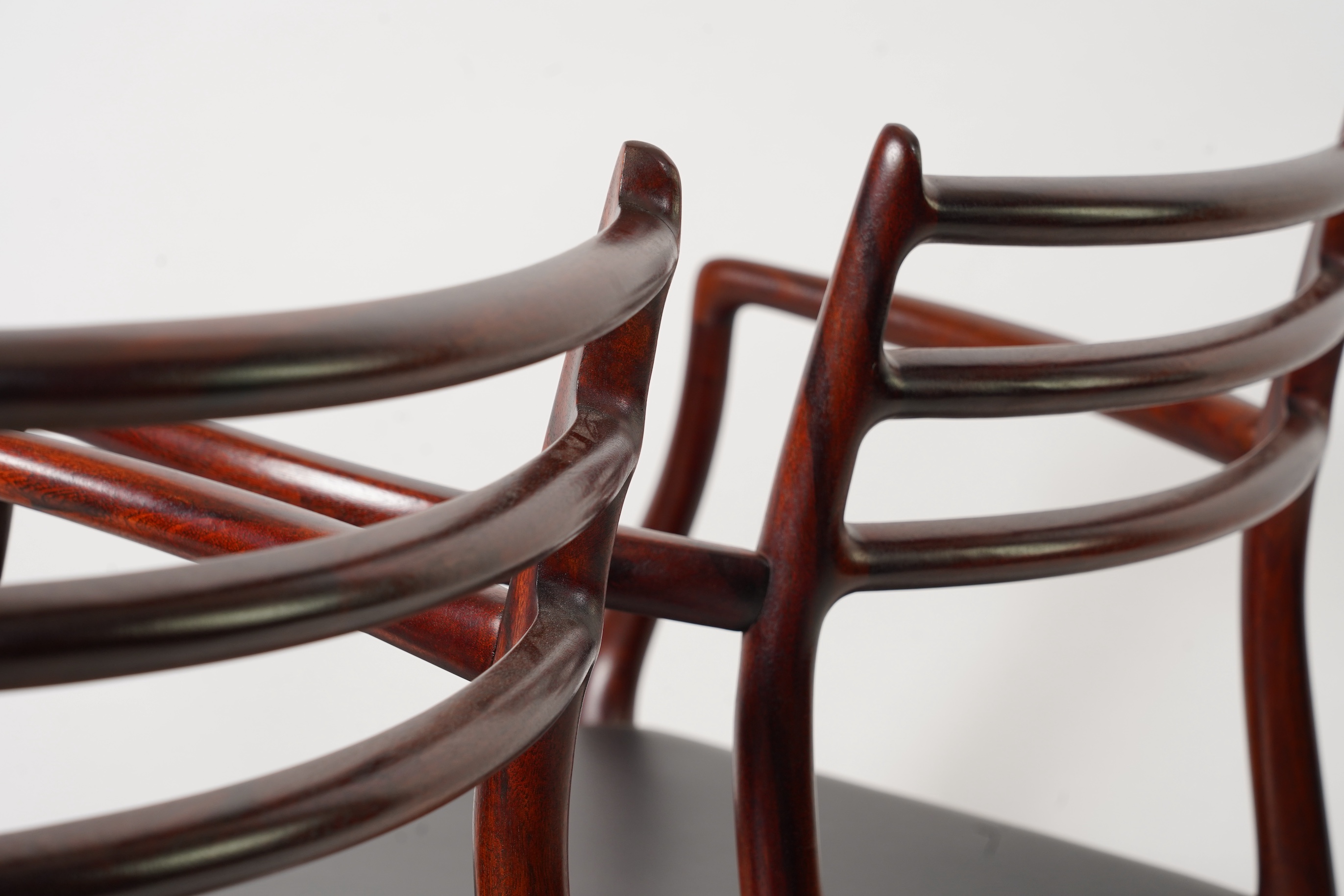 Niels Otto Møller (Danish, 1920-1982) for JL Møllers Møbelfabrik: A pair of 'Model 62' carver chairs